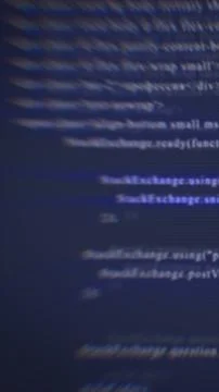 Abstract blurred digital code on a dark screen, representing programming, cyb Stock Illustration