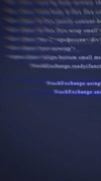 Abstract blurred digital code on a dark screen, representing programming, cyb 스톡 사진