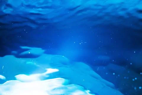 Abstract blurred futuristic sci-fi fountain water with reflection of lights b Stock Photos