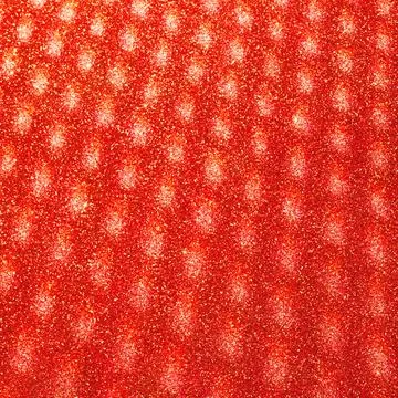 Abstract blurred glitter background in red colors. Stock Photos