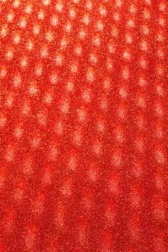 Abstract blurred glitter background in red colors. 写真素材