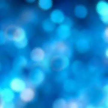 Abstract blurred glowing light particles of shades of blue Foto stock