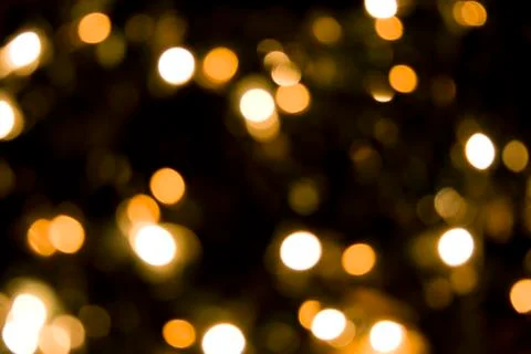 Abstract blurred glowing lights of light gold shades Stock Photos