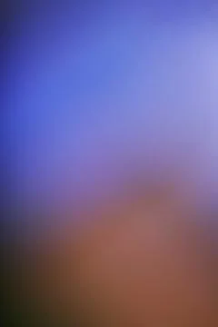 Abstract blurred gradient background with soft blue and orange color tones Stock Photos