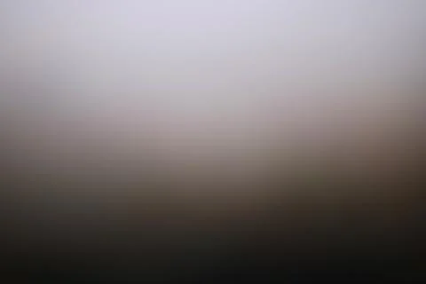 Abstract blurred gradient background with soft neutral grey and brown tones Stock Photos