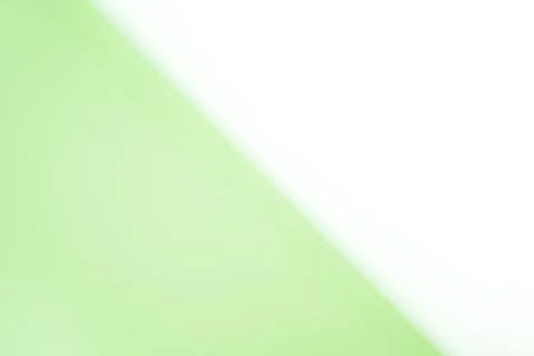 Abstract blurred gradient mesh background in bright white and lime green colo Stock Photos