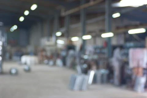 Abstract blurred industrial background image of a steel factory interior Foto stock