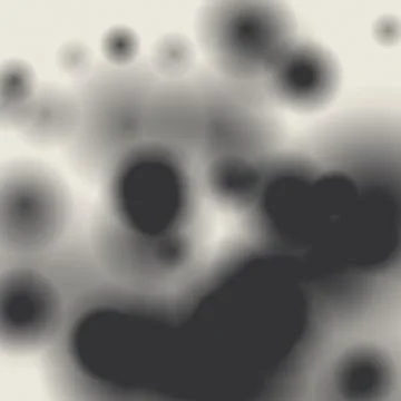 Abstract blurred ink splatter composition on white background Illustrazione stock