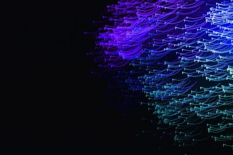Abstract blurred light on the black background Stock Photos