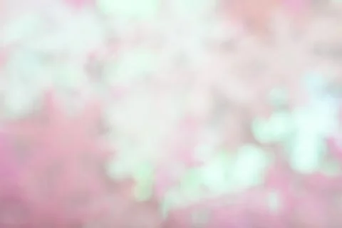 Abstract blurred light glitter background. Bright and colorful background. Stock Photos