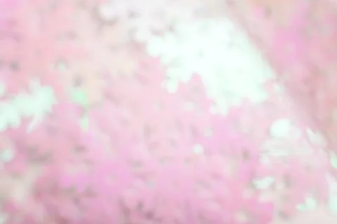 Abstract blurred light glitter background. Bright and colorful background. Stock Photos