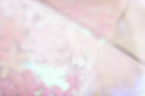 Abstract blurred light glitter background. Bright and colorful background. Stock Photos