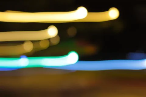 Abstract Blurred Light Trails in Motion, Yellow and Blue Bokeh Effect with Sl Stock Photos