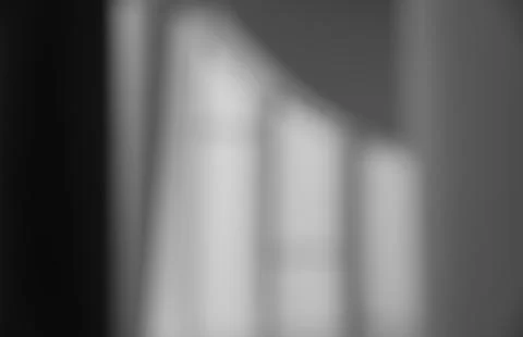 Abstract blurred monochrome background of soft window light patterns Stock Photos
