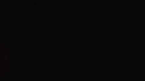 Abstract blurred orange and black background with soft glowing bokeh effect Stock Footage 341042106
