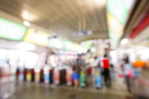 Abstract blurred people using automatic ticket gates Stock Photos
