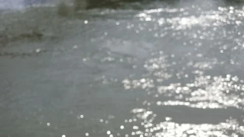 Abstract blurred river sunshine. Defocused reflection of light from the river Stock Footage 208858308