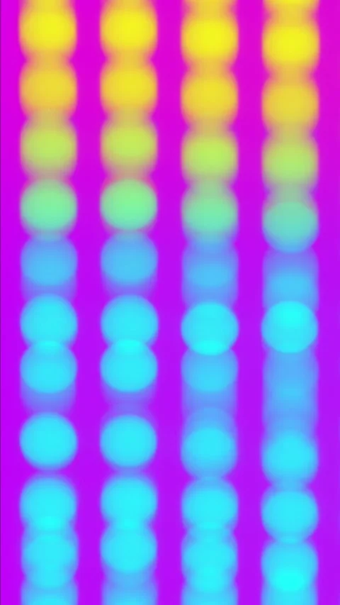 Abstract blurred round yellow lights bokeh change to blue and back again on pink Stock Footage 346761265