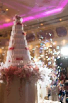 Abstract blurred soft of wedding cake and bubbles in the wedding banquet. Stock Photos