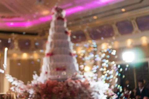 Abstract blurred soft of wedding cake and bubbles in the wedding banquet. Stock Photos