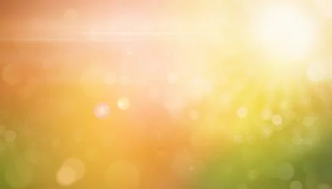 Abstract blurred sunny background with soft yellow, orange, and green tones.. Stockillustratie