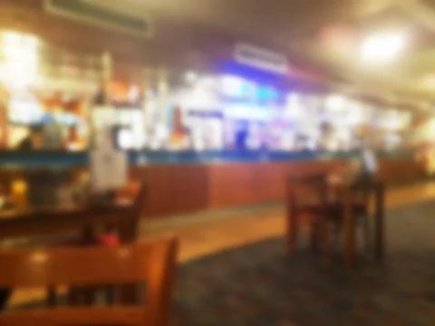 Abstract blurred view of the interior of the inside interior a bar pub cafe Stock Photos