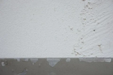 Abstract blurred white wall with focus on the cracking of powder coating Stock Photos