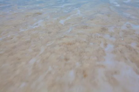 Abstract blurry background of soft waves and beach waves. Stock Photos