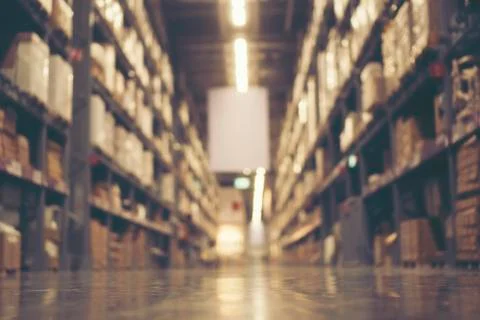 Abstract blurry background of warehouse storing with a lot of large box stack Foto stock