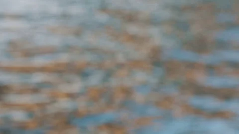 Abstract blurry background of water surface Stock Footage 76925125