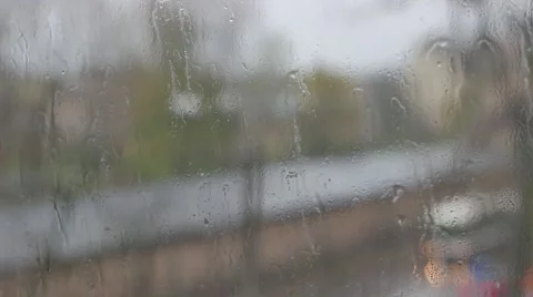 Abstract blurs of lights and rain drops through the window Vidéo 49606216