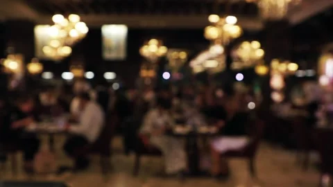 Abstract bokeh background of blurred cafe with people. Defocused background.. Stock Footage 232609996