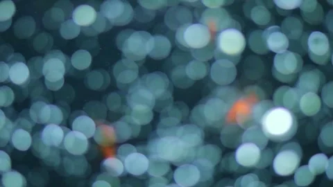 Abstract bokeh background with blurred lights and hints of red, ideal for d.. Stock Footage 341348574