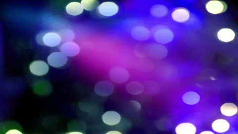 Abstract bokeh background with colorful glowing lights. Defocused festive Video stock 339394199