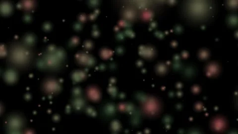 Abstract bokeh background featuring blurred green and brown light circles on Stock Footage 323108513