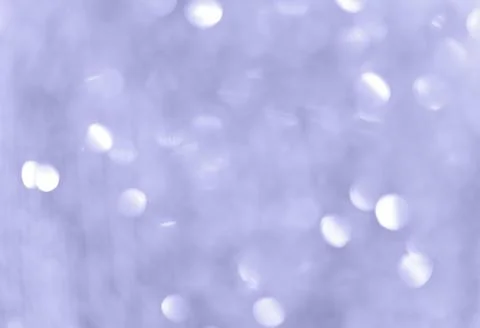 Abstract bokeh background. Light violet blue wallpaper. Color of the year 2022 Stock Photos