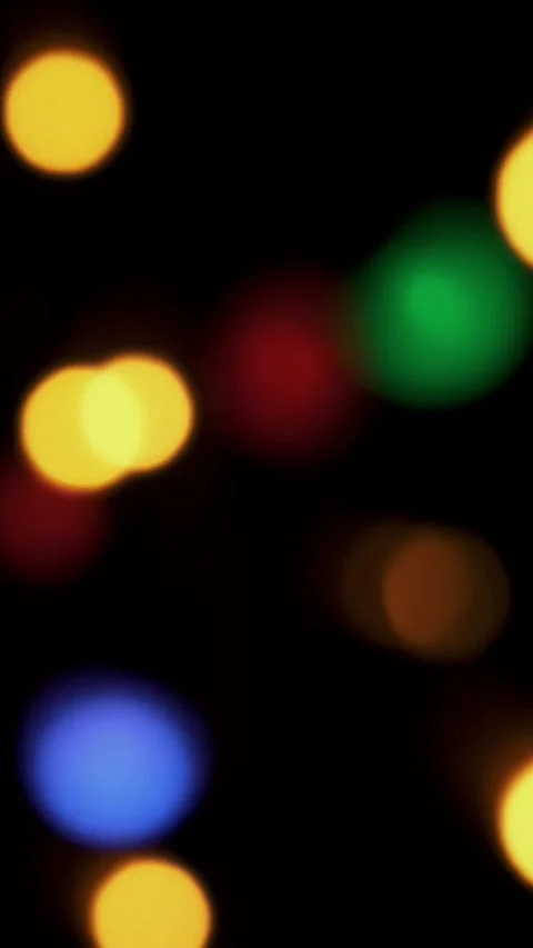 Abstract bokeh background in motion. shining, blurred golden particles, lights. Stock Footage 323366886