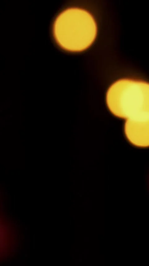 Abstract bokeh background in motion. shining, blurred golden particles, lights. Stock Footage 323366977
