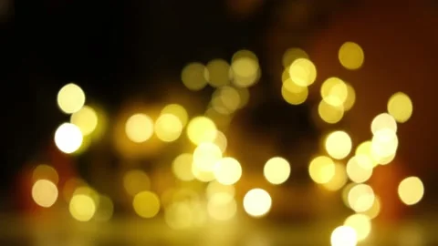 Abstract bokeh background, shining, glowing, blurred gold lights. Defocused Stock Footage 161211791