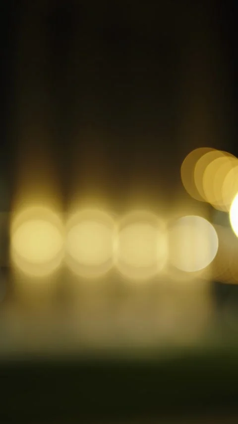 Abstract bokeh background with soft golden blurry lights at night. Stock Footage 342371706