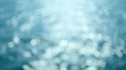Abstract bokeh background from summer blue sea water Stock Footage 129681803