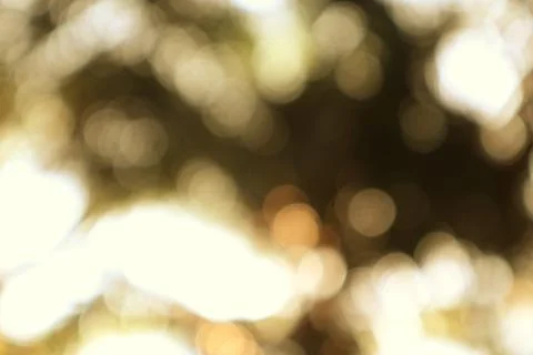 Abstract Bokeh Background with Warm Light and Muted Colors Detail Stock Photos