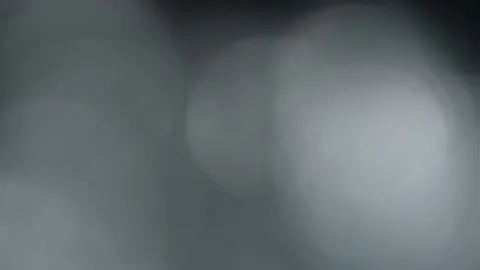 Abstract bokeh light leaks on a gray background Stock Footage 160836365