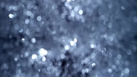 Abstract bokeh light particles floating in motion. Soft glowing dots creating dy Stock Footage 340450303