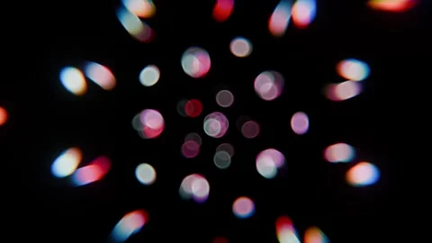 Abstract Bokeh Light Particles Orbiting in Seamless Loop Background. 4K Stockbeeldmateriaal 334600135