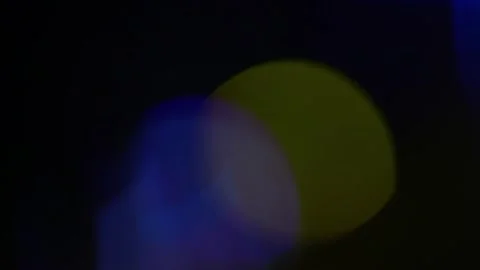 Abstract Bokeh Light Play in Deep Blue and Vibrant Red Hues with Soft Blurr.. Video stock 341917539