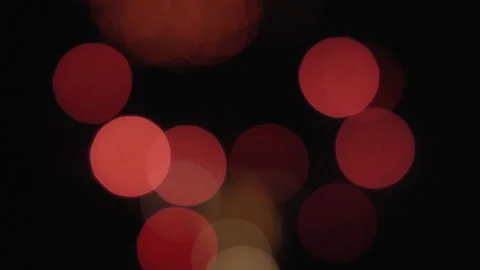 Abstract bokeh lights background of exploding fireworks in the sky Video stock 319808585
