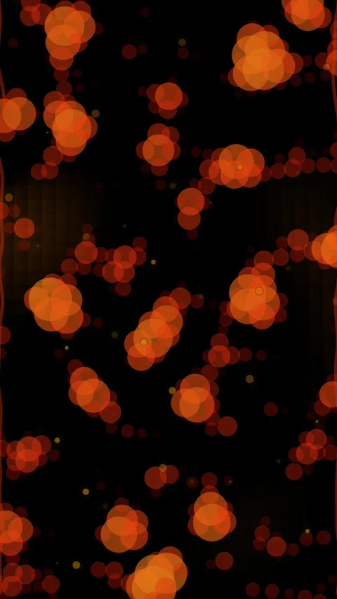 Abstract Bokeh Lights Background - Glowing Orange and Red Particle Effect Stock Footage 345492450