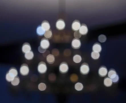 Abstract bokeh lights on dark background Stock Photos