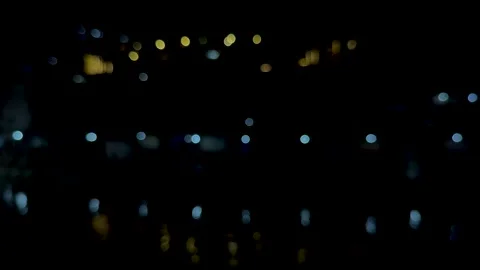 Abstract bokeh lights in the darkness creating a mesmerizing pattern of glo.. Stock Footage 340219787